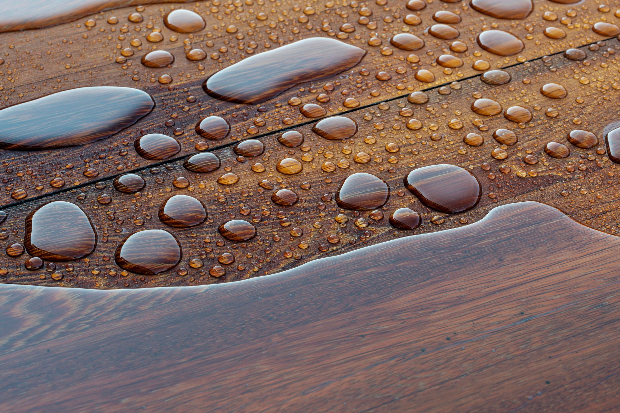 Wooden planks bathed in the rain