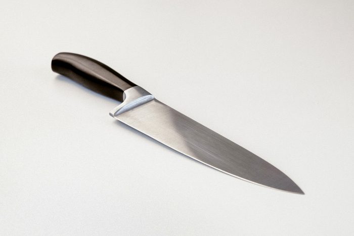 chef knife on a gray background