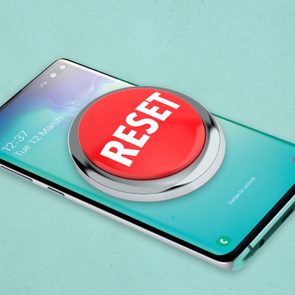 Reset button on top of android phone to symbolize factory reset