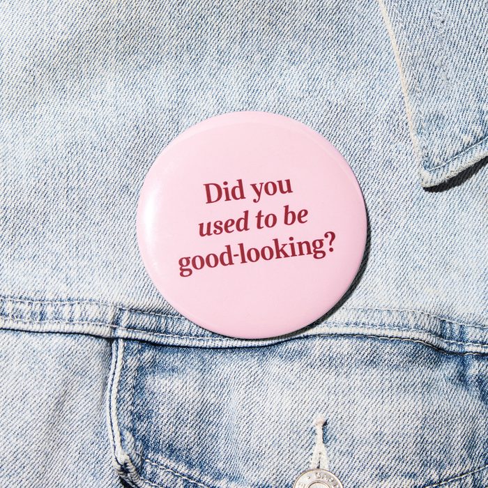 denim jacket detail with a button that says, "Did you used to be good looking?"