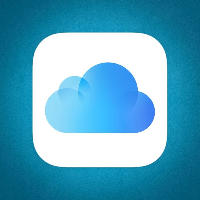 iCloud logo on blue paper background