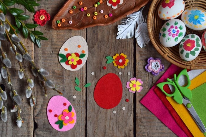 Making of handmade easter eggs from felt with your own hands. Children's DIY concept. Making Easter decoration or greeting card. Step 1. Cut out the egg.