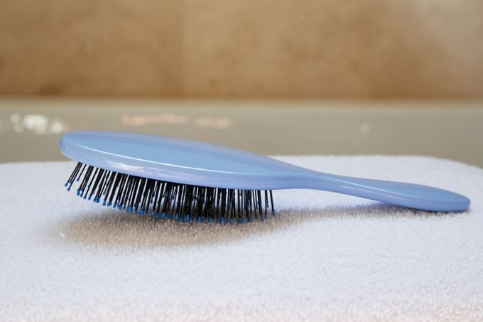 hair brush drying on a towel