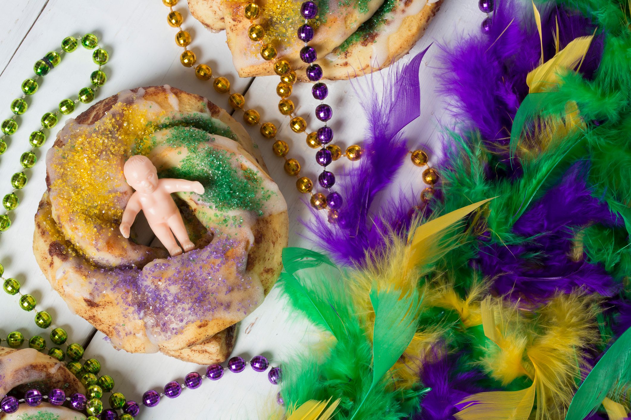 Mardi Gras King Cakes, Beads, and Baby