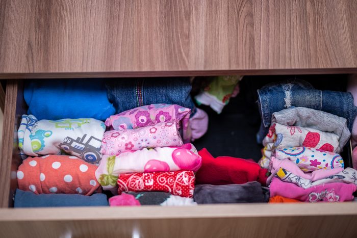 Vertical storage of clothing. Clothing folded for vertical storage in the linen drawer