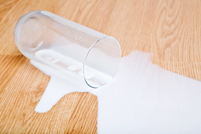 milk spilled from glass