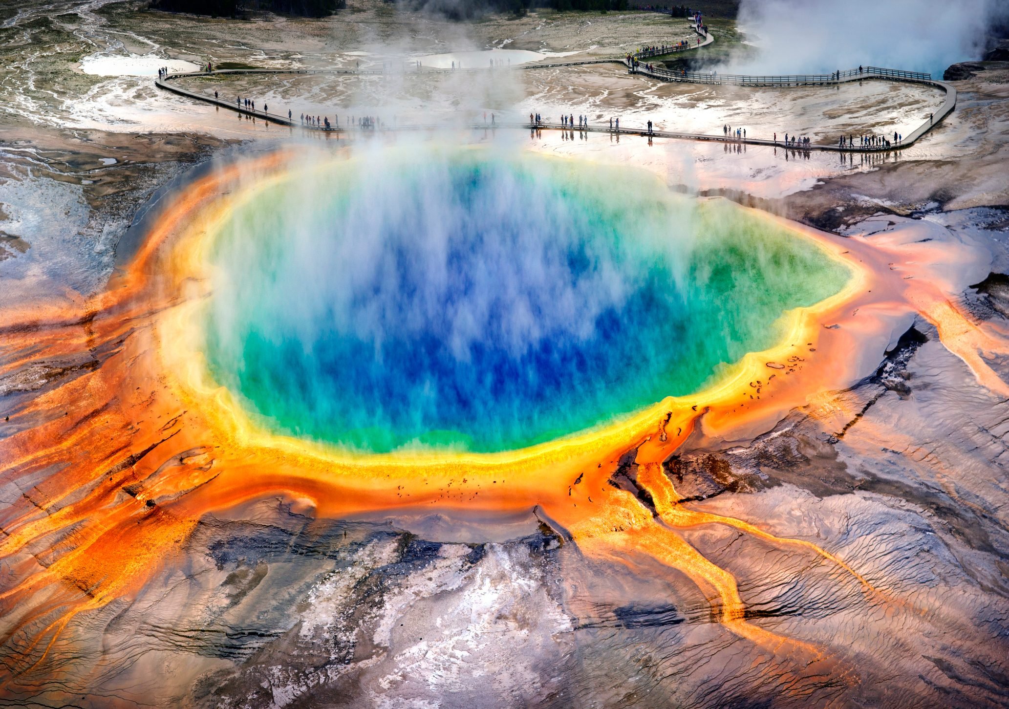 Aerial view of Grand Prismatic Spring, Midway Geyser and viewing walkway at Yellowstone National Park, Wyoming
