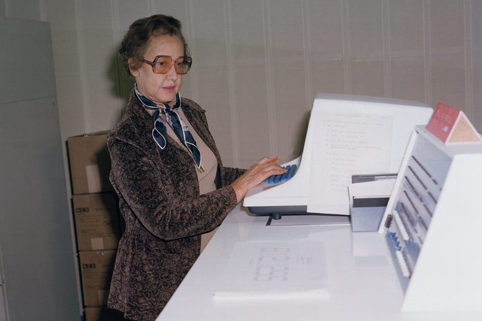 NASA space scientist, and mathematician Katherine Johnson poses for a portrait at work at NASA Langley Research Center in 1980 in Hampton, Virginia.