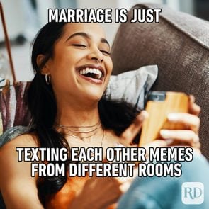 Woman laughing at phone. Meme text: Marriage is just texting each other memes from different rooms
