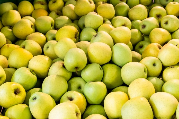 Full Frame Shot Of Apples At Market Stall.