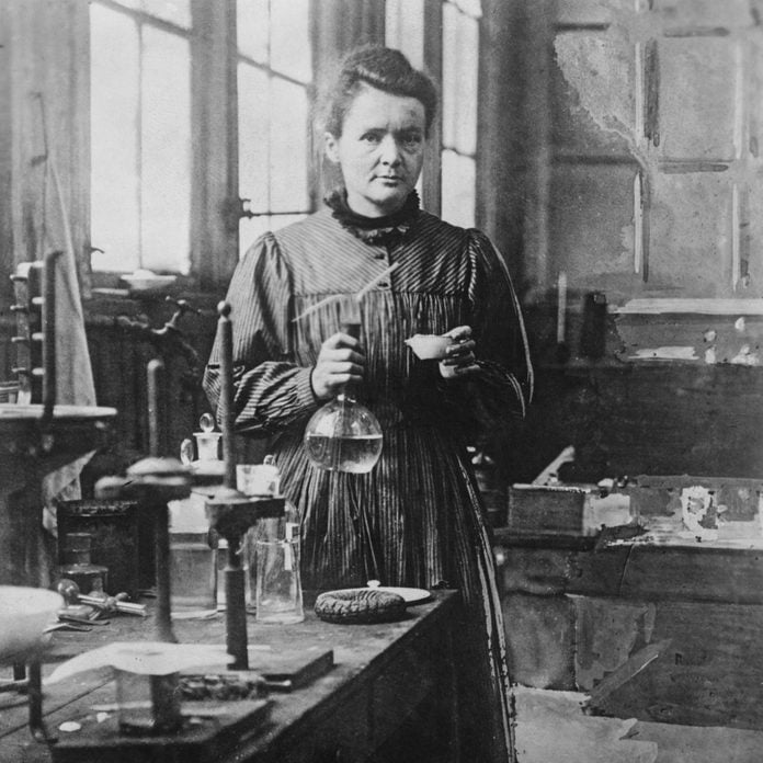 Madame Curie (1867-1934), noted physical chemist, poses in her Paris laboratory. Undated photograph.