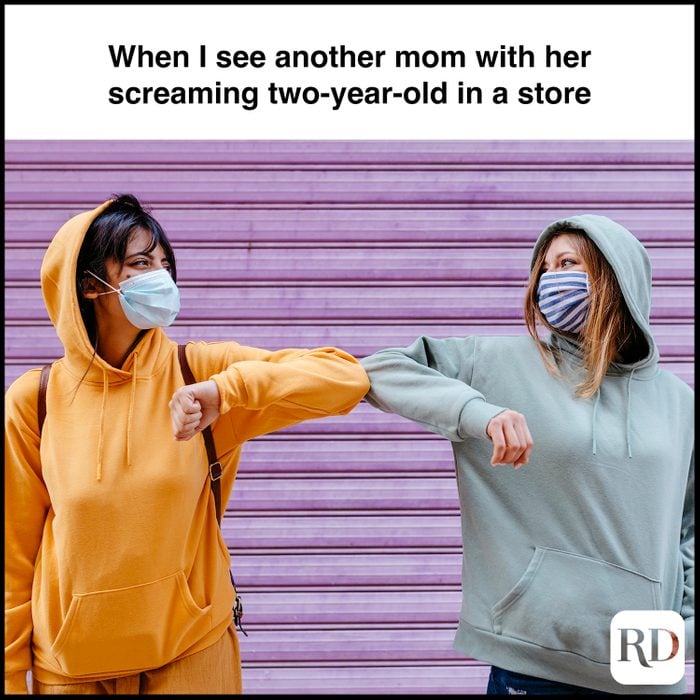 Two women touching elbows. MEME TEXT: When I see another mom with her screaming two-year-old in a store