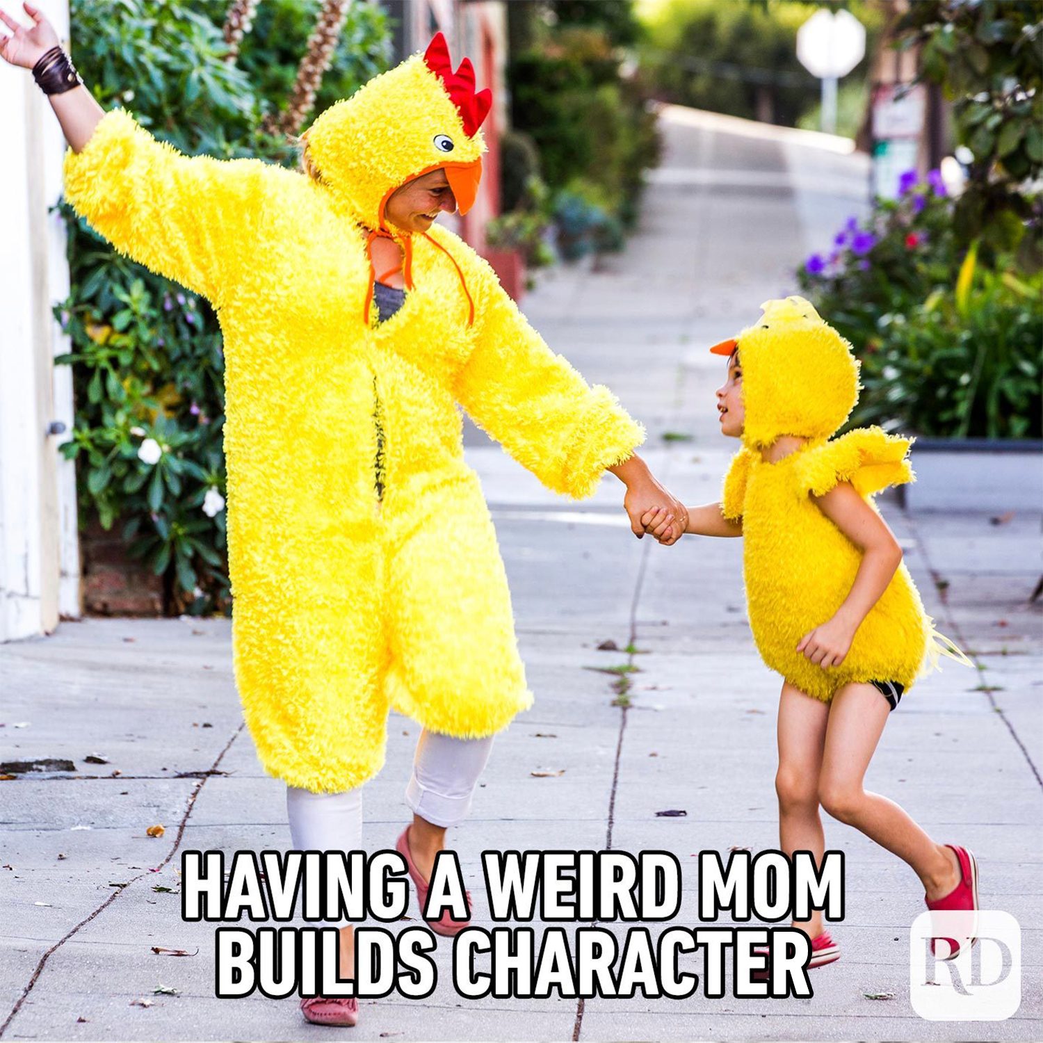 Mom and daughter in chicken costumes MEME TEXT: Having a weird mom builds character