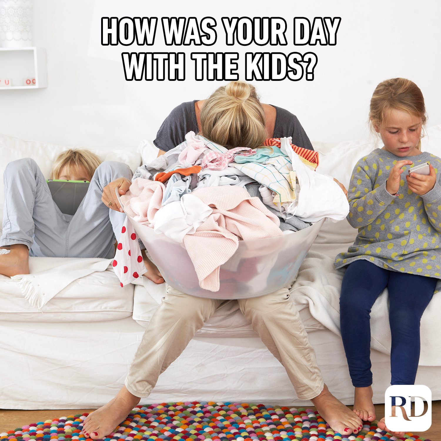 Woman face down in laundry basket MEME TEXT: How was your day with the kids?