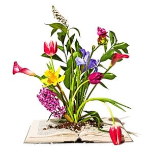bouquet of flowers blooming out of the center of an open book