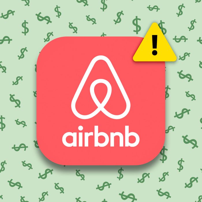 Airbnb app logo with a warning symbol