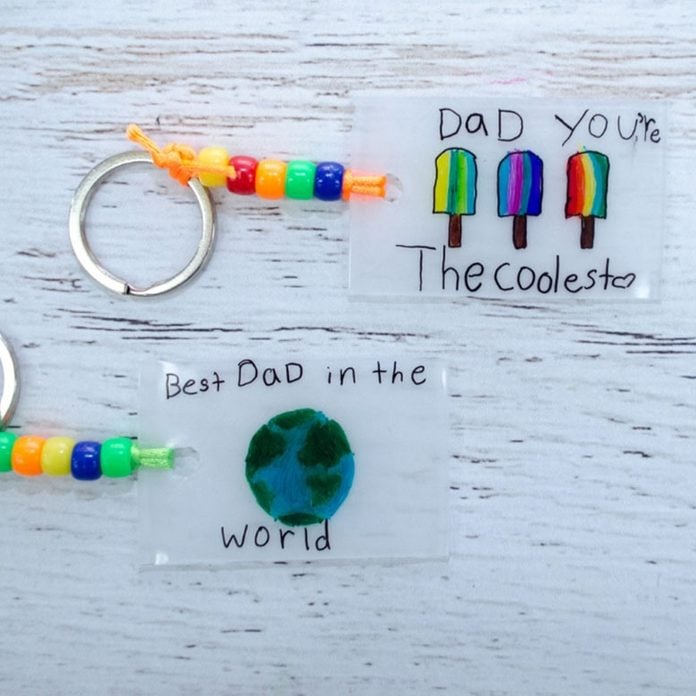 Homemade Fathers Day Keychains featuring a globe and beads