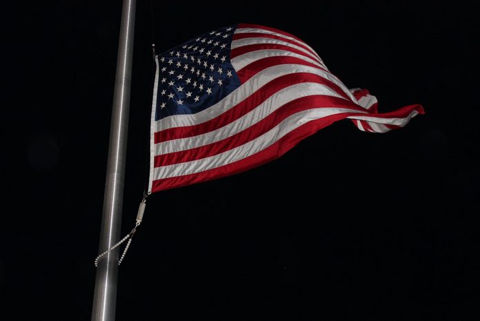 US Flag in the Wind at Night