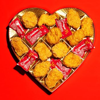 valentine candy box with mcdonalds chicken nuggets and ketchup packets where the chocolate would be