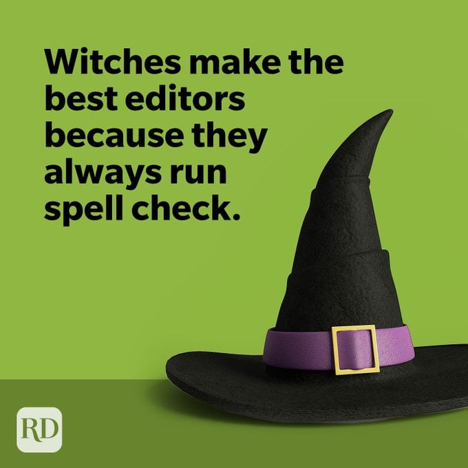 Black witch hat with purple buckle on green background