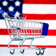 shopping cart with american flag background for memorial day sales concept