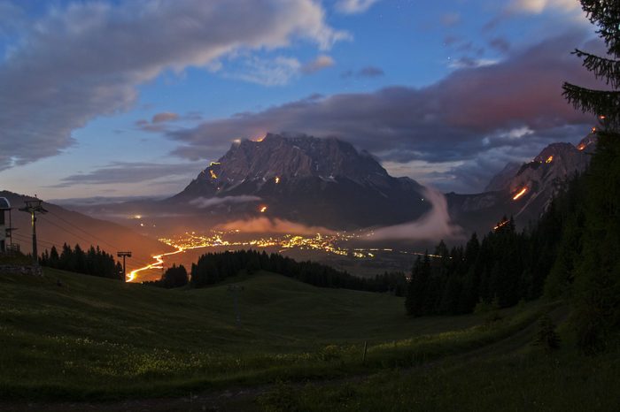 Mountain bonfires during solstice in Tyrol, Austri