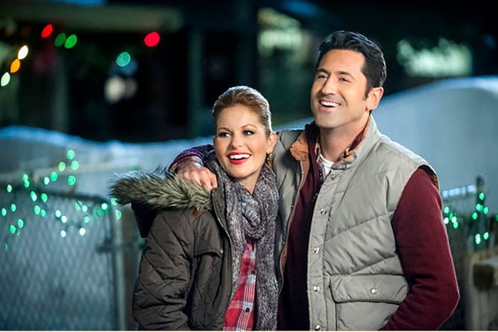 CHRISTMAS UNDER WRAPS - When a driven doctor doesn't get the prestigious position she planned for, she unexpectedly finds herself moving to a remote Alaskan town. Photo: Candace Cameron Bure, David O'Donnell Photo Credit: Copyright 2014 Crown Media United States LLC/Photographer: Fred Hayes