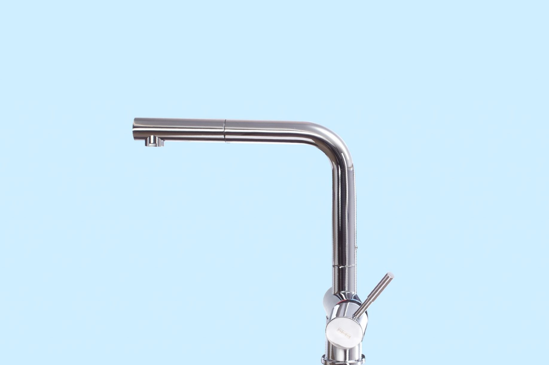 Close-Up Of Faucet Over Blue Background