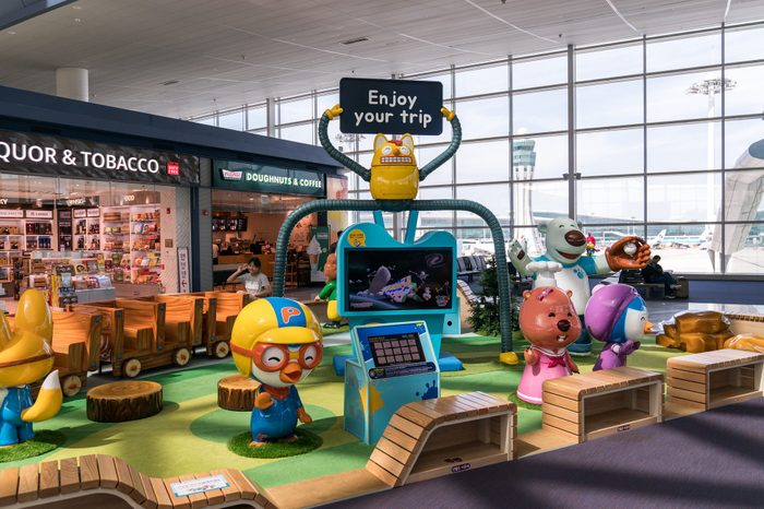 childrens play area inside an airport terminal