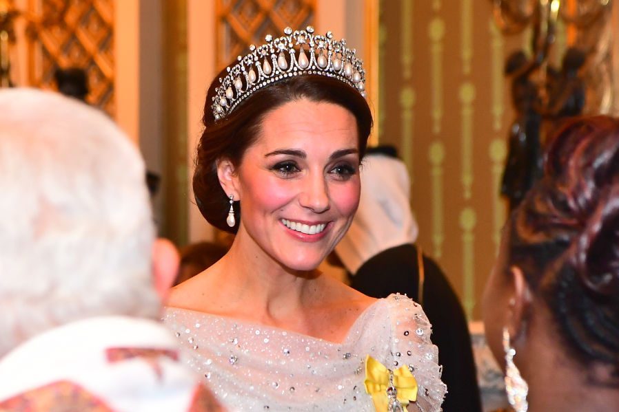 Catherine, Duchess of Cambridge greets guests at an evening reception for members of the Diplomatic Corps at Buckingham Palace on December 04, 2018 in London, England wearing the Cambridge Lover's Knot tiara