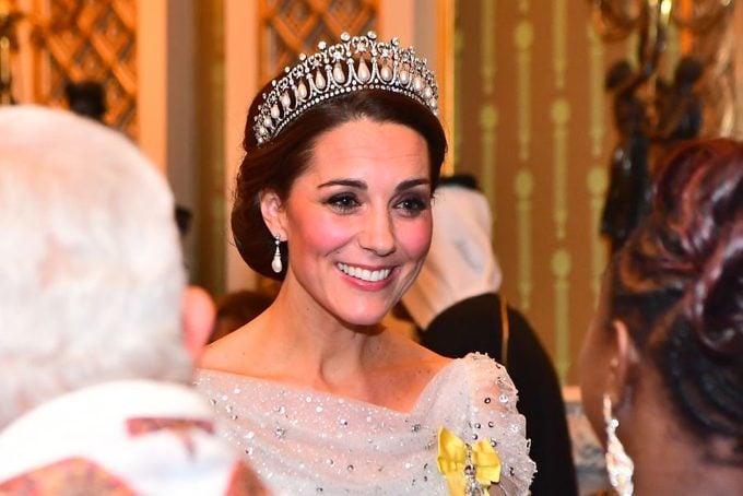 Catherine, Duchess of Cambridge greets guests at an evening reception for members of the Diplomatic Corps at Buckingham Palace on December 04, 2018 in London, England wearing the Cambridge Lover's Knot tiara