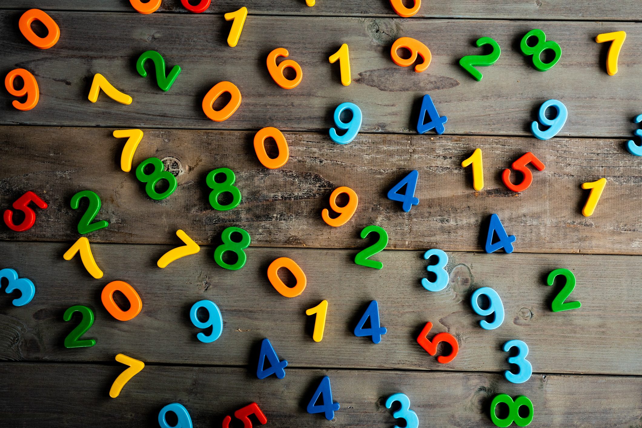 Colorful numbers on wooden table