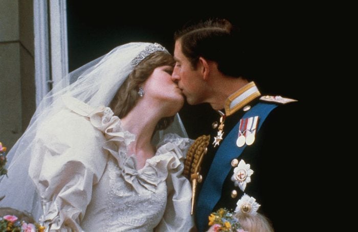 Wedding of Prince Charles and Lady Diana Spencer. Shows the famous kiss on the balcony of Buckingham Palace, after ceremony.