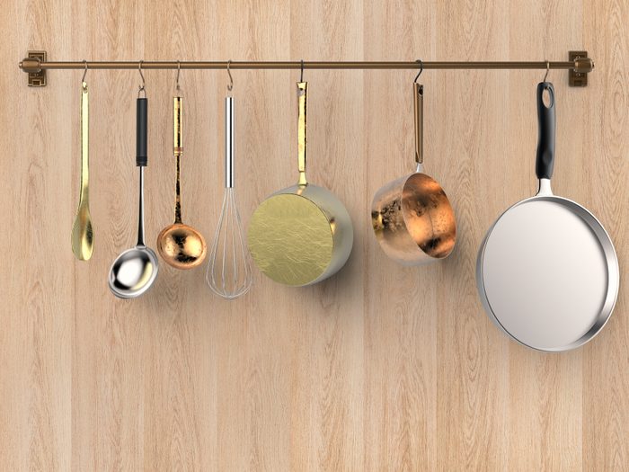 kitchen rack hanging with kitchen utensils