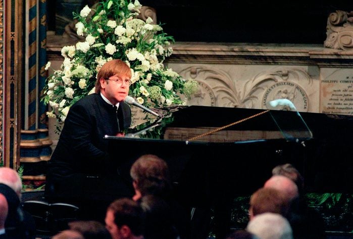 Sir Elton John sings 'Candle in the Wind' at the funeral if Diana, Princess of Wales at Westminster Abbey