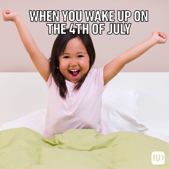 Gettyimages 81859967 Girl Stretching In Bed Waking Up For 4th Of July