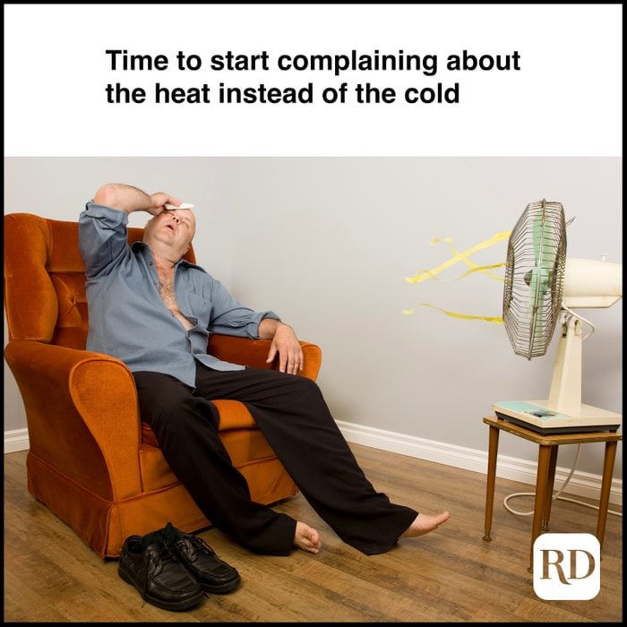Man fainting on chair in front of fan MEME TEXT: Time to start complaining about the heat instead of the cold