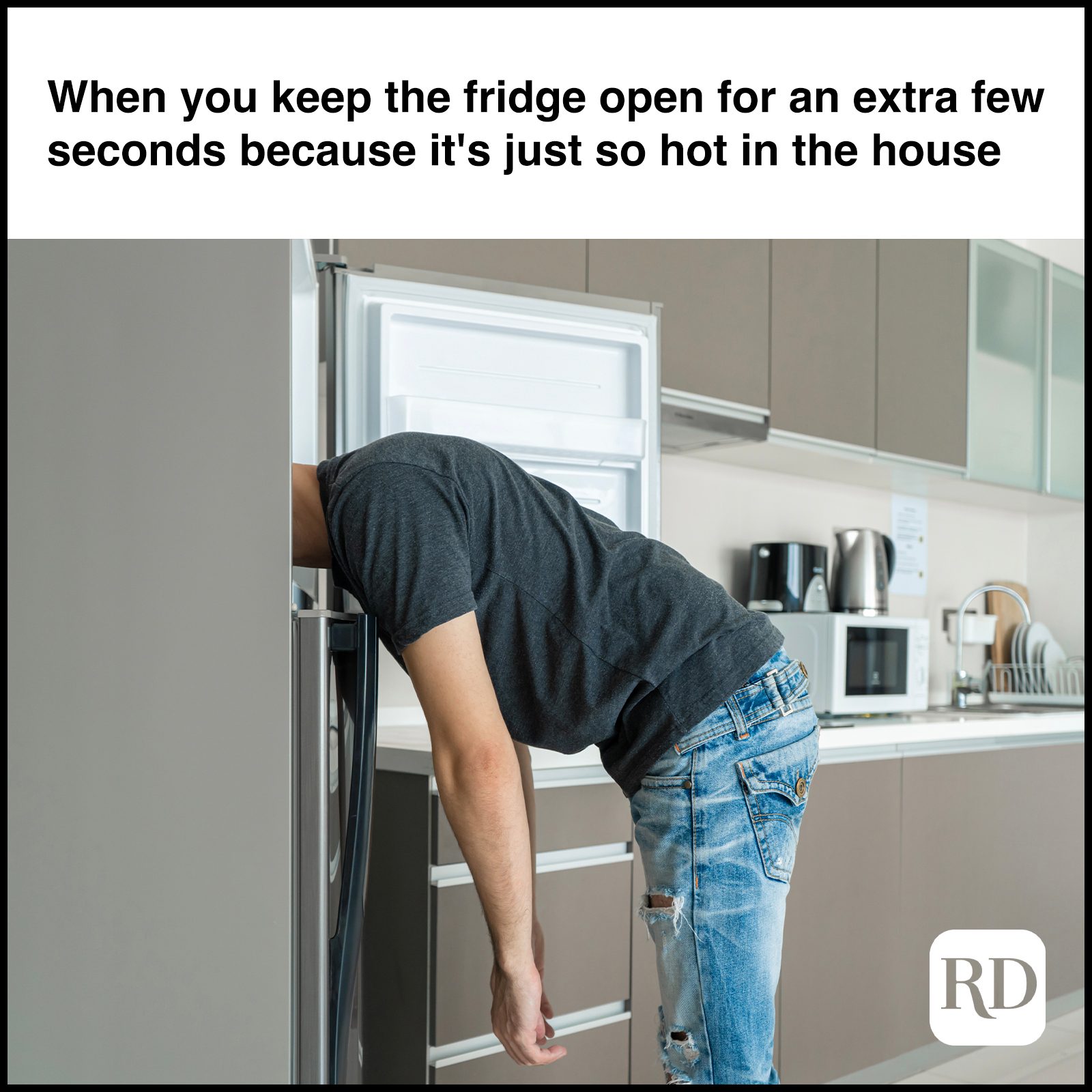 Man with head in fridge MEME TEXT: When you keep the fridge open for an extra few seconds because it's just so hot in the house