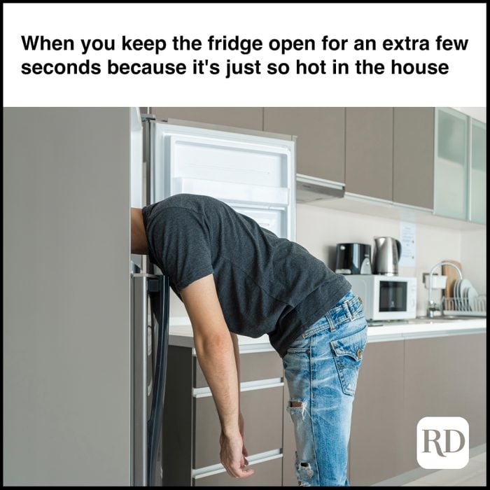 Man with head in fridge MEME TEXT: When you keep the fridge open for an extra few seconds because it's just so hot in the house
