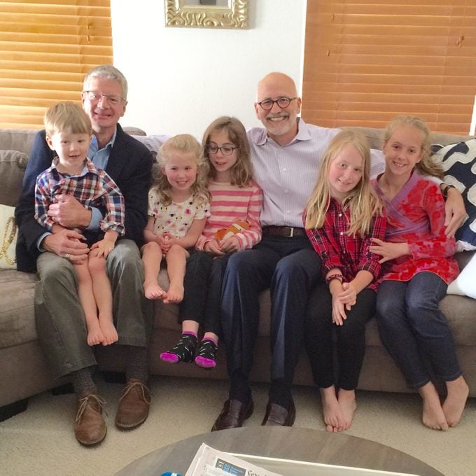 Larry Best, his husband Kori, and their grandchildren
