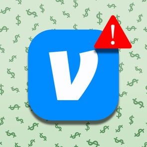 venmo logo with alert icon over dollar signs background