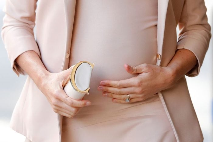 close up of meghan markle's pregnant belly