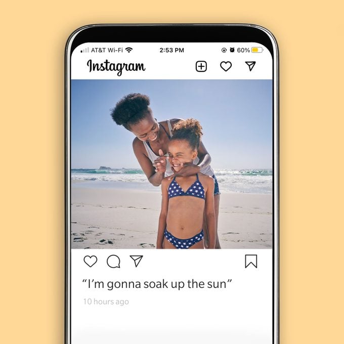 instagram mock up on a phone with a photo of mom and daughter at the beach with a beach related lyric as the caption