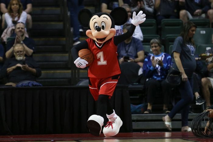 Mikey Mouse playing basketball