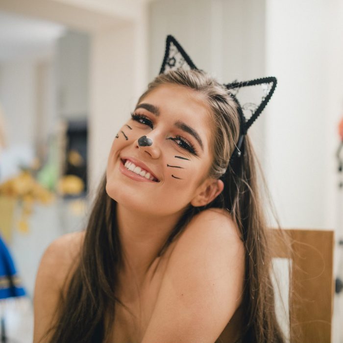 girl dressed as a cat for halloween