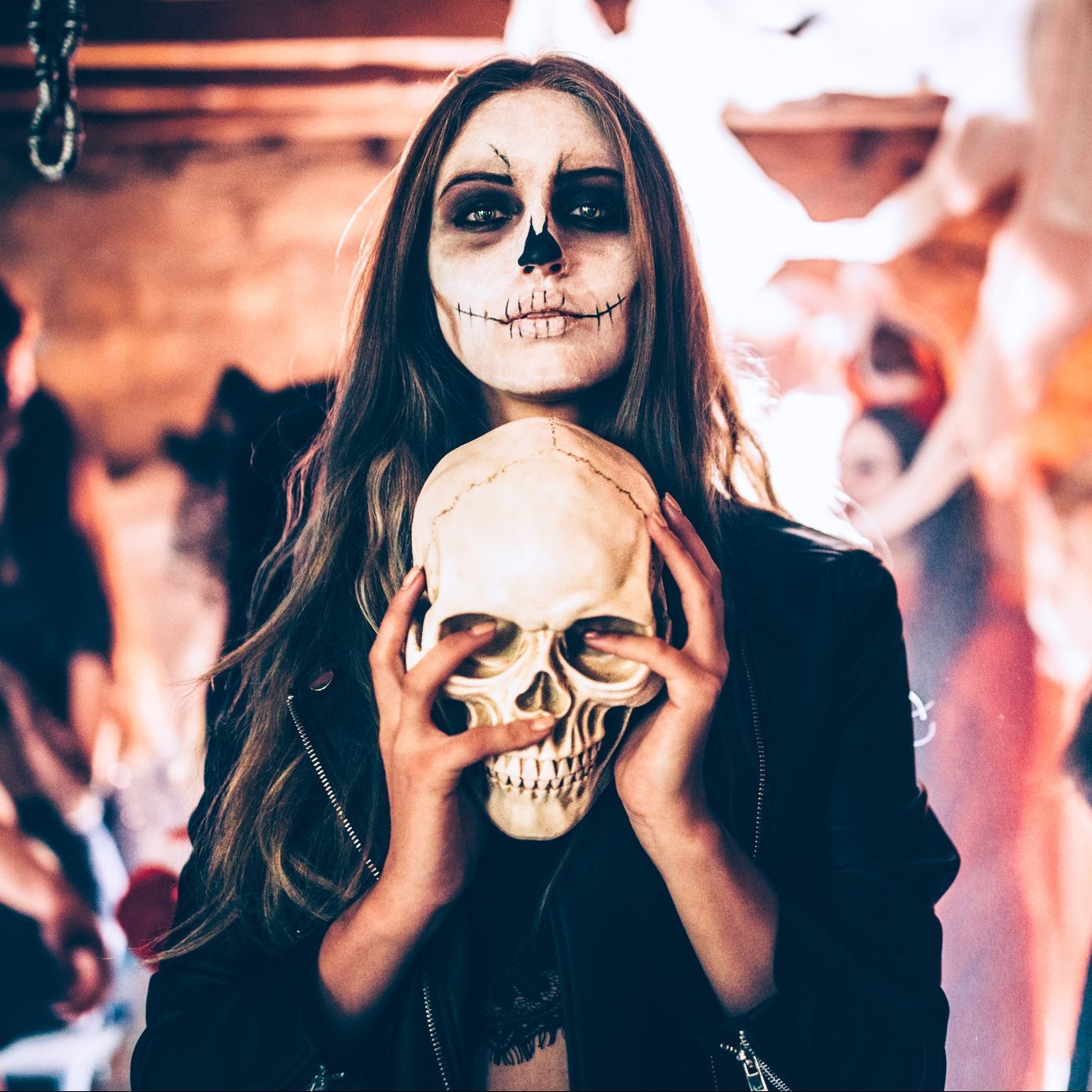 woman dressed as a skeleton at halloween party