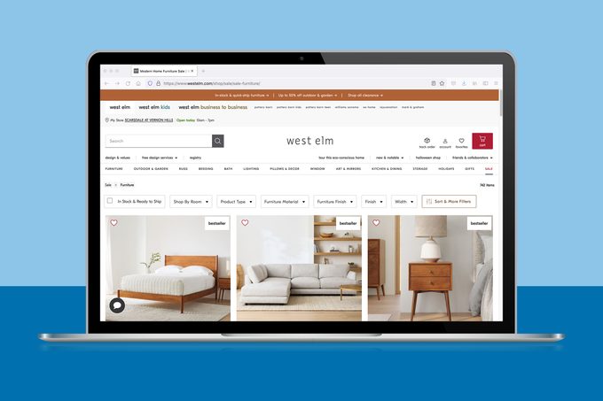 westelm.com page showing bedroom furniture on a laptop