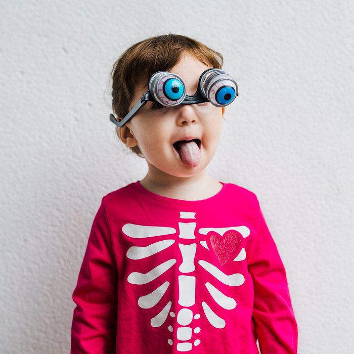 toddler dressed as a silly skeleton for halloween