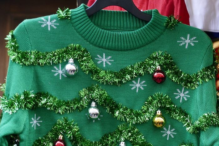 ugly christmas sweater decorated with ornaments