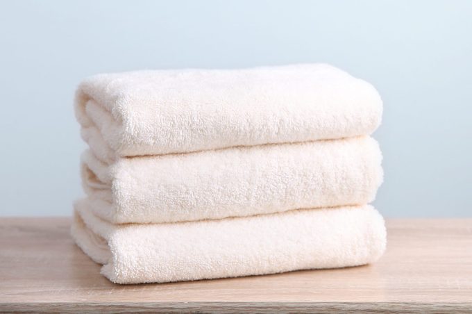 Stack of folded white towels 
